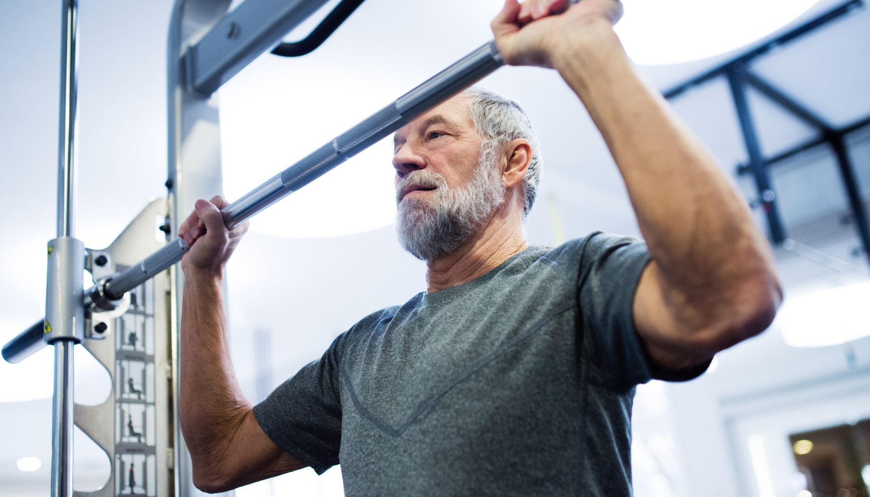 a 50+ man pulling whieght in gym